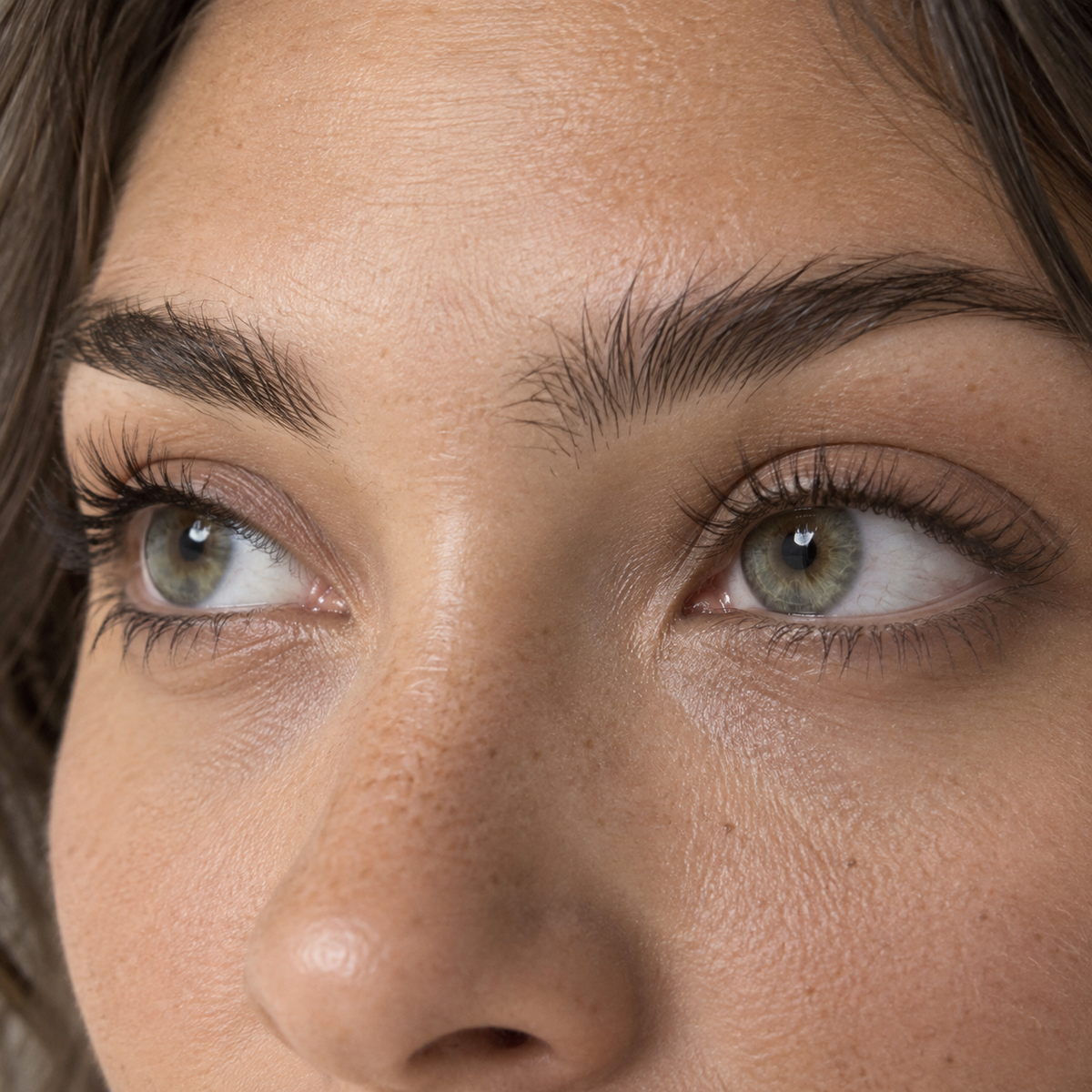 Juniper Sage Ripple Green colored contacts - a visible but wearable green change on dark eyes built from a proven high-conversion color family
