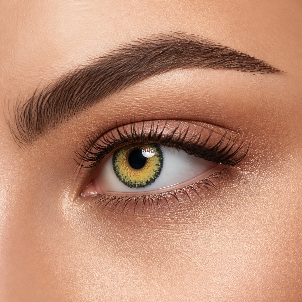 Khaki colored contacts - a muted khaki-olive halo with a bright yellow-green center that reads naturally in daylight