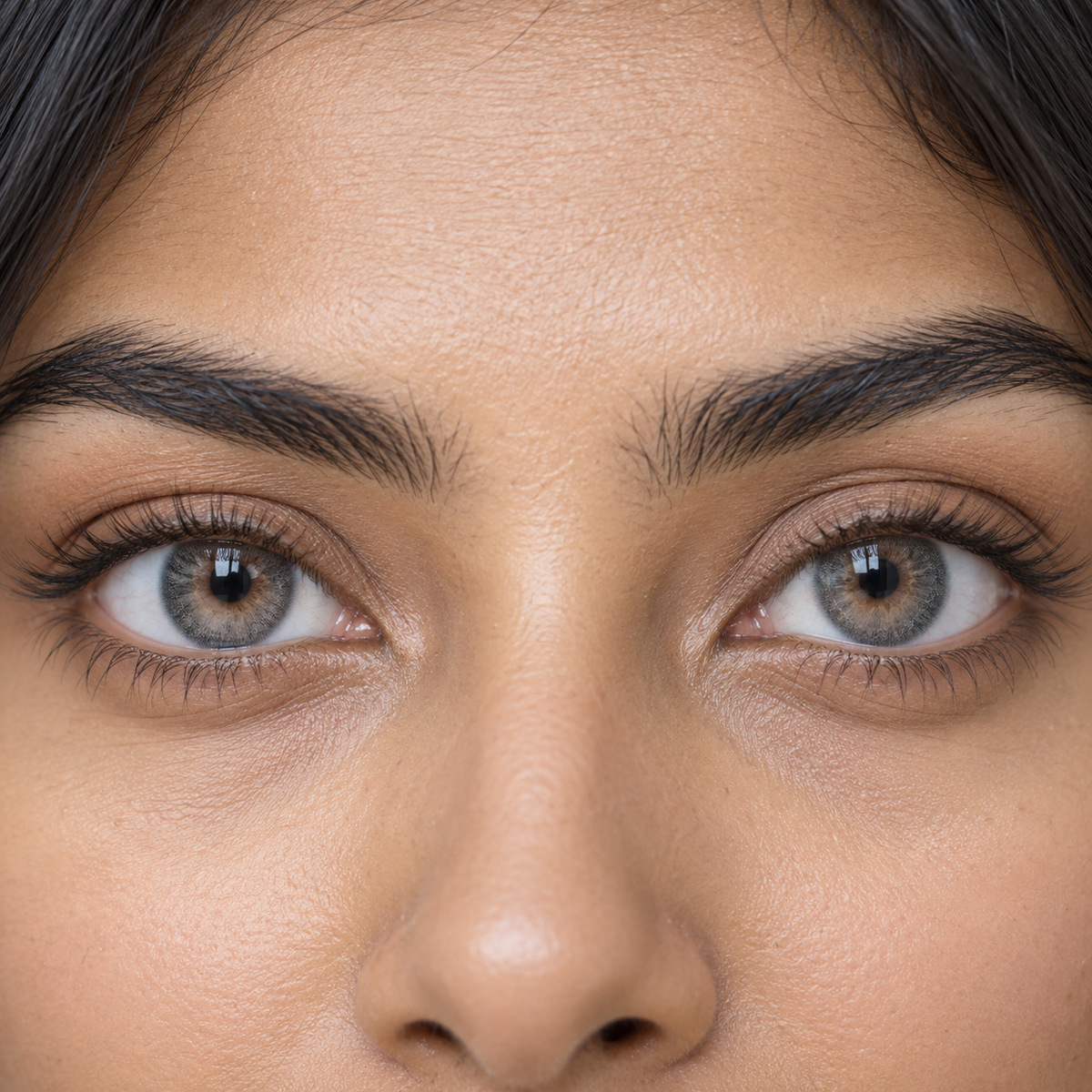 Slate Greige Pearl Wash colored contacts - current cool-gray beauty demand translated into a sourceable three-tone everyday lens