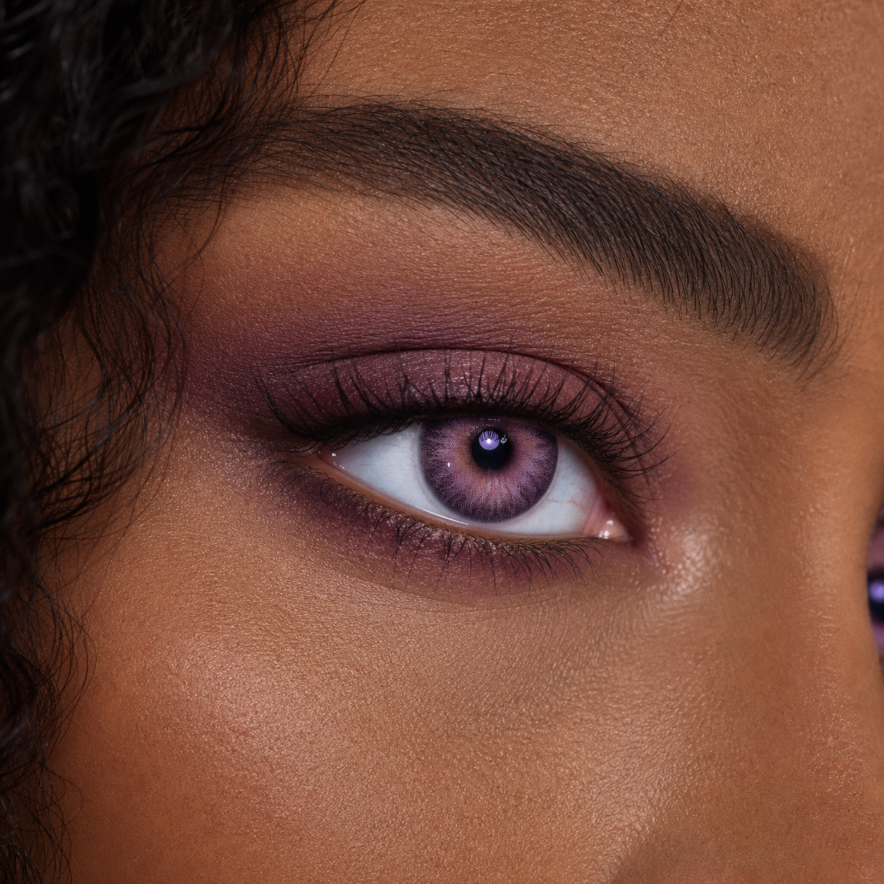 Plum Veil Amethyst colored contacts - a wearable plum shade with a visible light-catching color shift