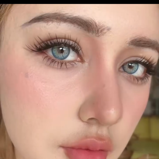 Aqua Moon Grey colored contact lenses by Moxielens