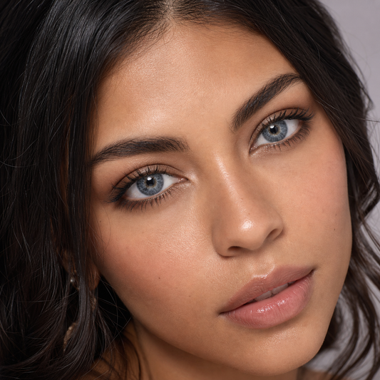 Storm Glass Split Blue colored contacts on model - soft romantic close-up