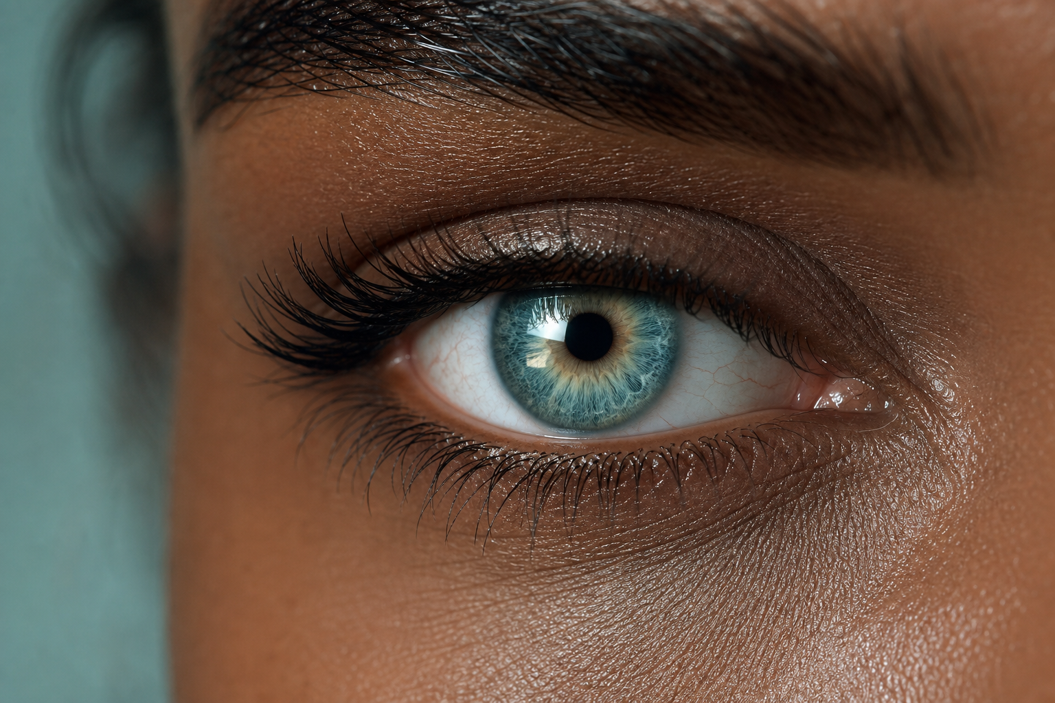 Aqua Tide Teal colored contacts - a wearable teal shift with a visible multi-tone iris texture
