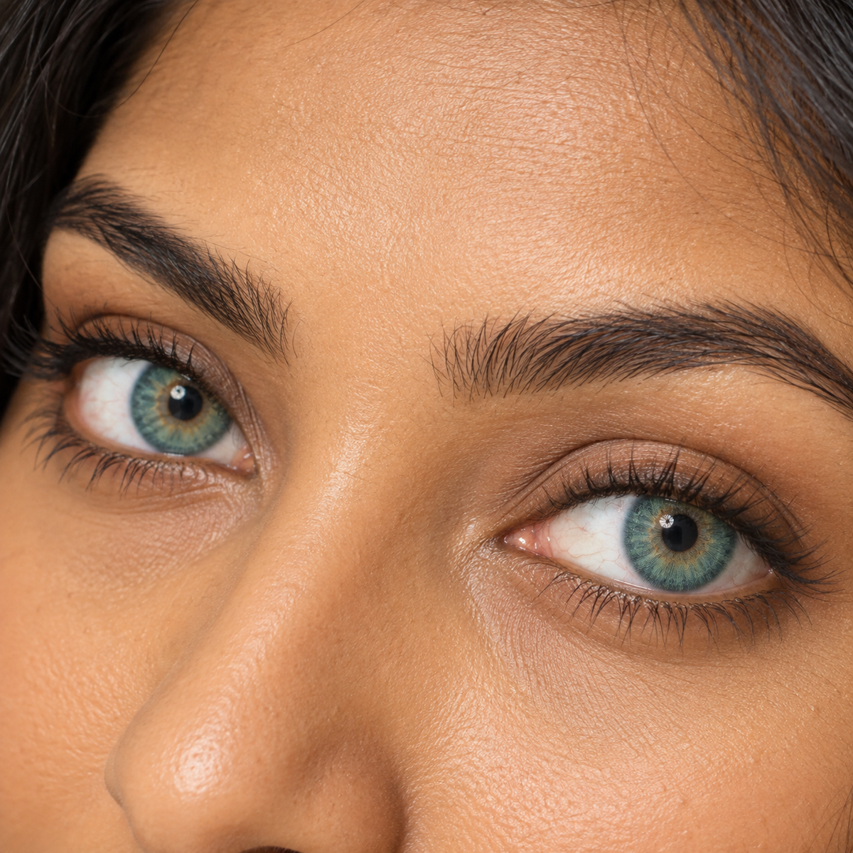 Aegean Mint Feather Gradient colored contacts - proven green demand shifted into a sourceable aqua-mint three-tone lens without a novelty print