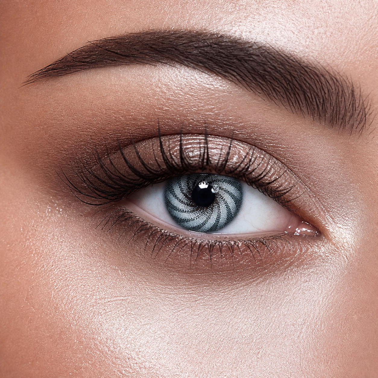 Swirl Ice Blue colored contacts - a crisp black-white vortex that turns an icy blue-gray base into an immediately recognizable fantasy eye